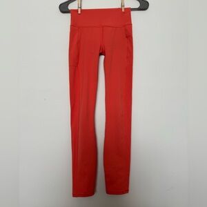 Vuori Women’s Orange Leggings XXS